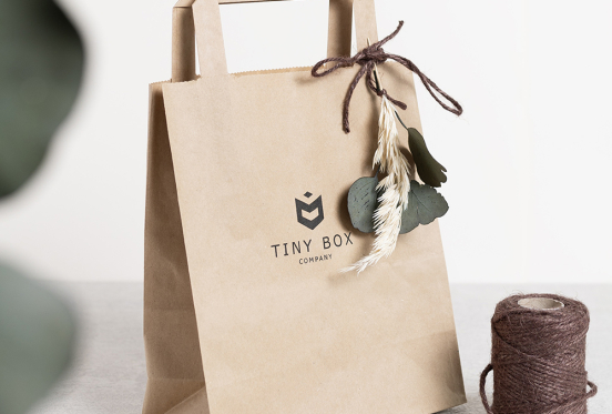 Create an unboxing moment with gift bags